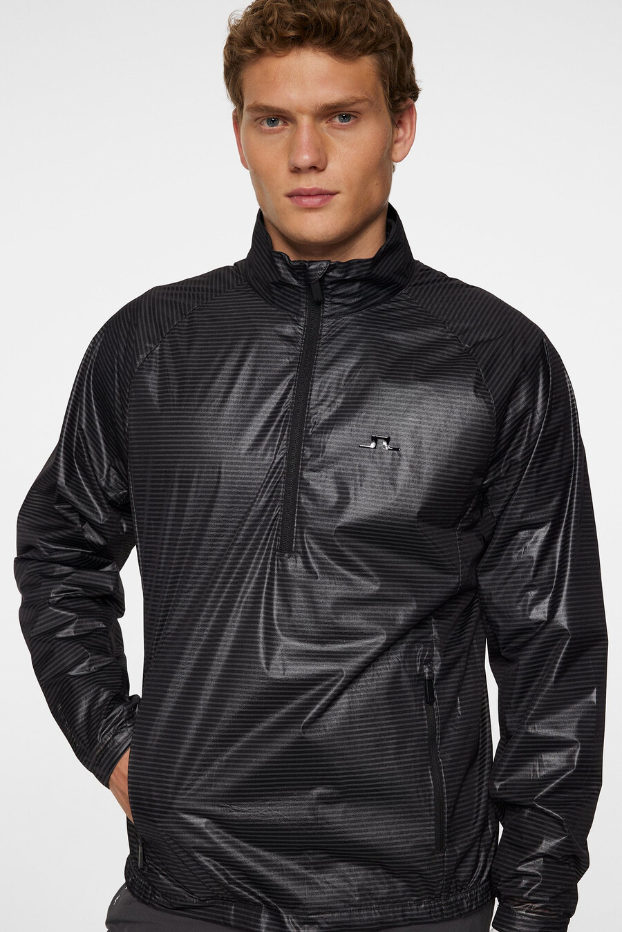 veste coupe-vent pour sac à dos