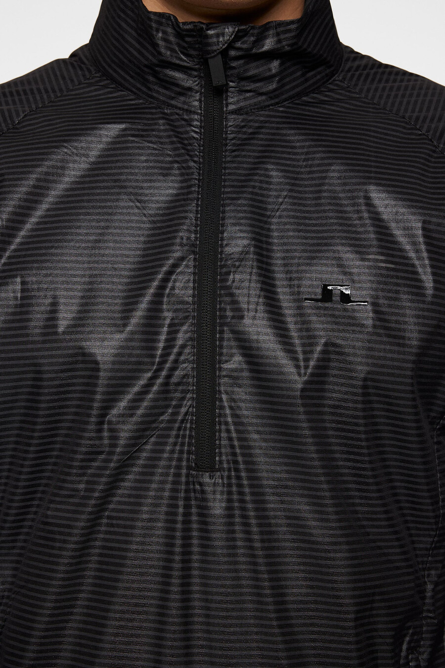 veste coupe-vent pour sac à dos
