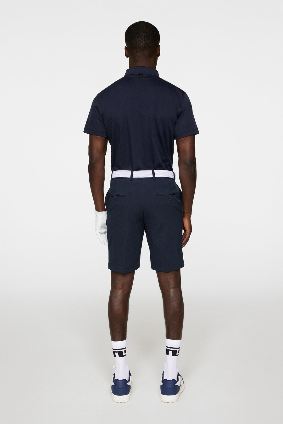 short de golf moulant et ventilé